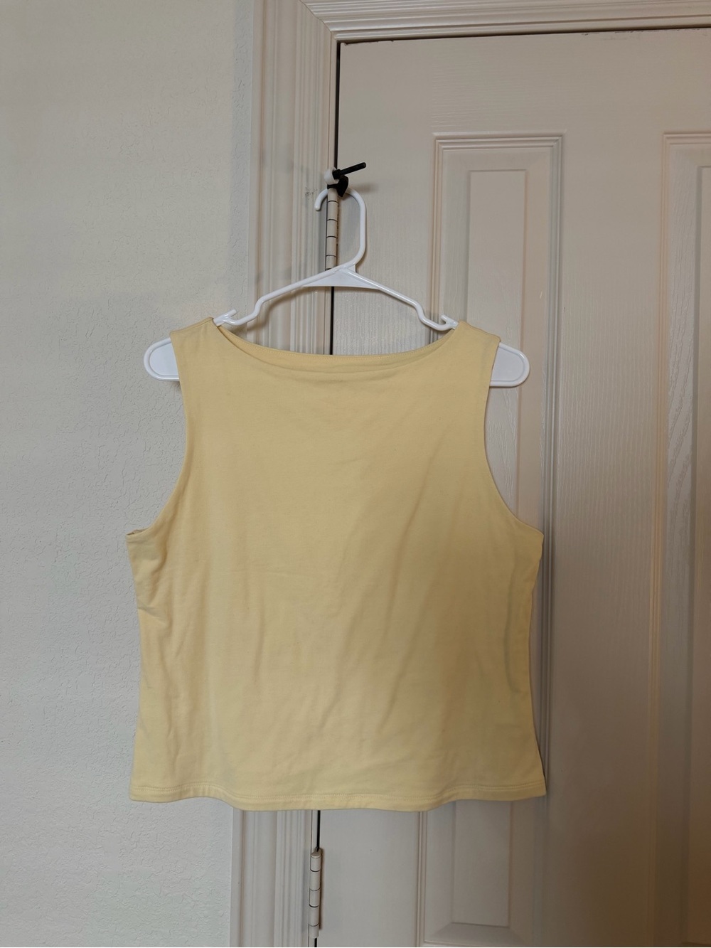 a new day Soft Pale Yellow Sleeveless Tank